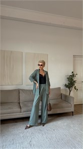 {{photo.Alt || photo.Description || 'Брюки Rich'}}
